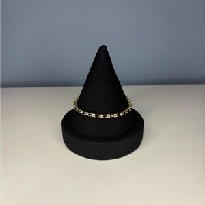 Elegant Gold and Black Tennis Bracelet